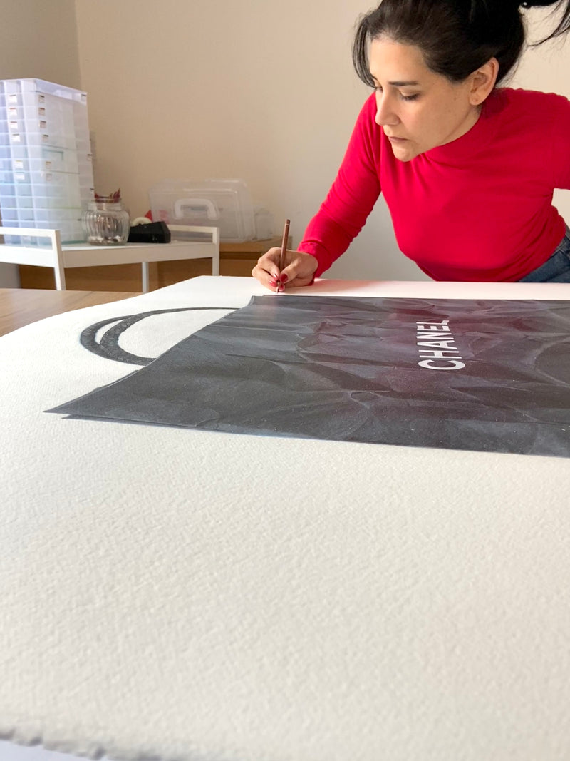 Cecilia Mendoza CM Visual Artist Drawing a Chanel paper bag with carat d’ache